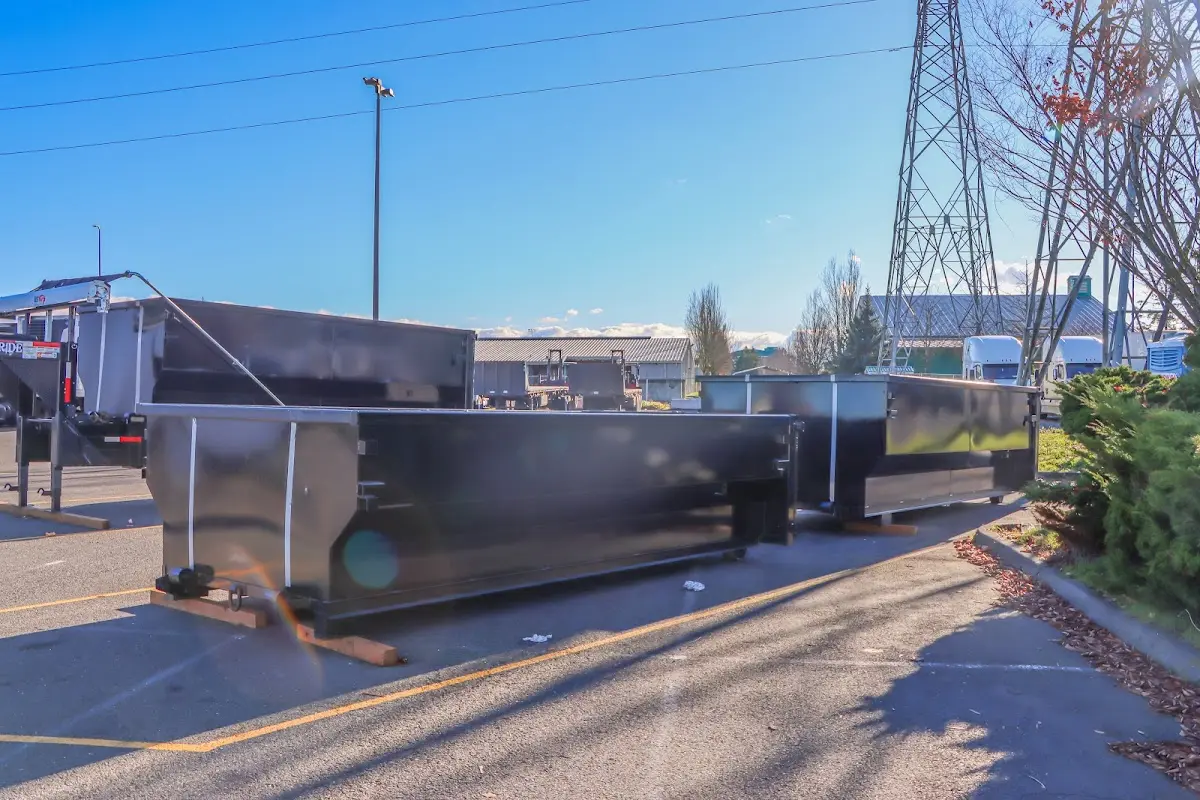 Roll-off dumpster ready for waste disposal at job site for 2 Yard Dumpster Rental in Bayville